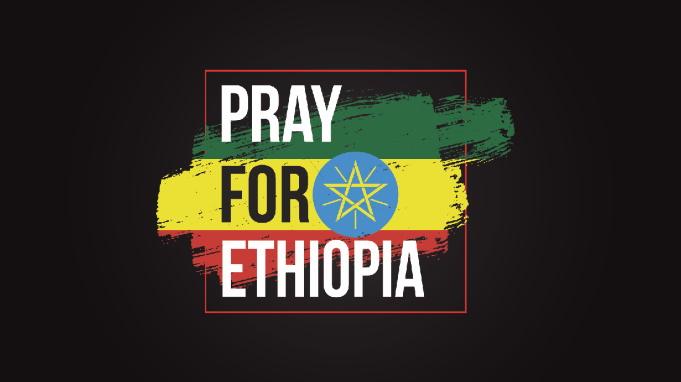 Pray for Ethiopia -teksti Etiopian lipun päällä.